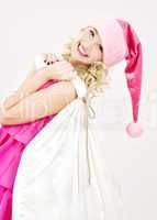 cheerful santa helper girl with big bag
