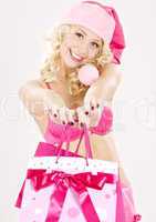 santa helper with pink shopping bags