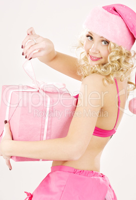 cheerful santa helper girl with gift box