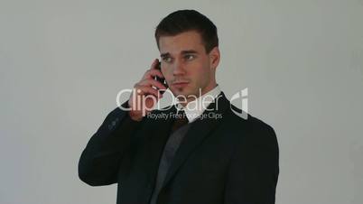 HD1080p25 Young businessman with mobile phone