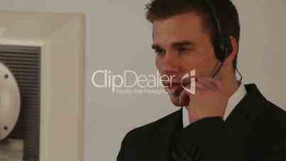 HD1080p25 Young businessman with headset