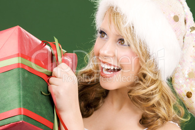 happy santa helper with gift box
