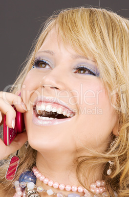 happy girl with pink phone