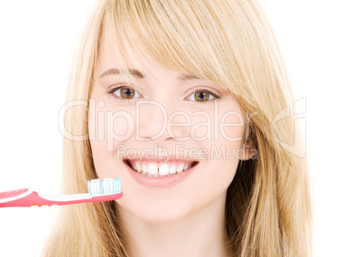 happy girl with toothbrush