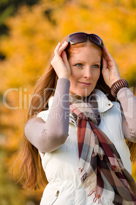 Autumn park - long red hair woman fashion