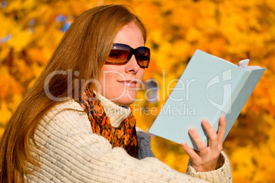 Autumn sunset country - woman read book