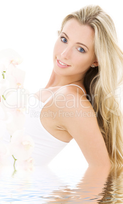 blonde in cotton underwear with orchid