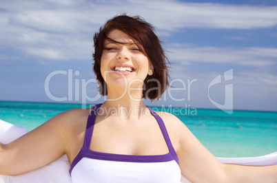 happy woman with white sarong