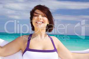 happy woman with white sarong