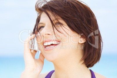 happy woman with white phone