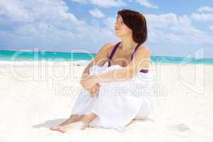 happy woman with white sarong