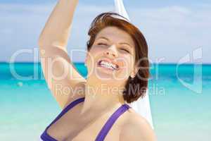 happy woman with white sarong