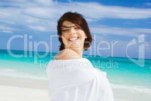 happy woman with white sarong