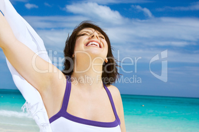 happy woman with white sarong