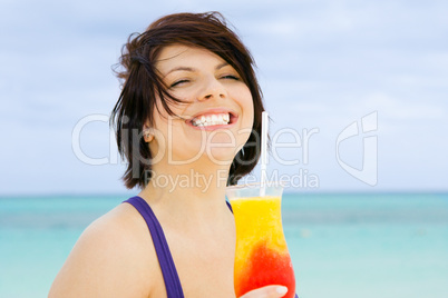 happy woman with colorful cocktail