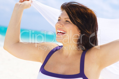 happy woman with white sarong