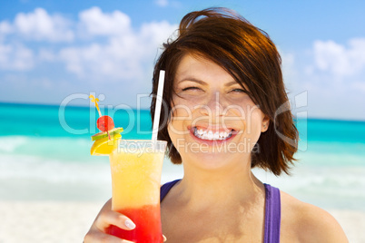 happy woman with colorful cocktail