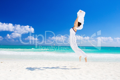 happy woman with white sarong