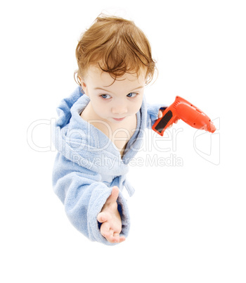 baby boy with toy drill