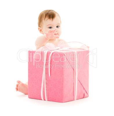 baby boy with big gift box