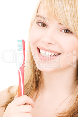 happy girl with toothbrush