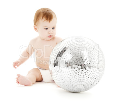 adorable baby boy with big disco ball