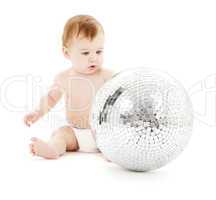 adorable baby boy with big disco ball