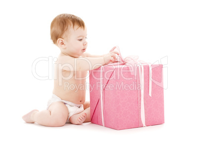 baby boy with big gift box