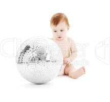 adorable baby boy with big disco ball