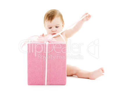 baby boy with big gift box