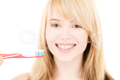 happy girl with toothbrush