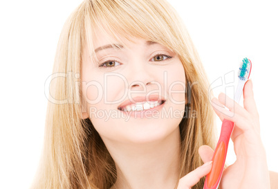 happy girl with toothbrush