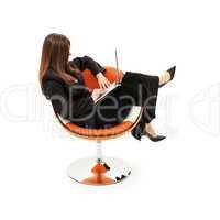 businesswoman in chair with laptop