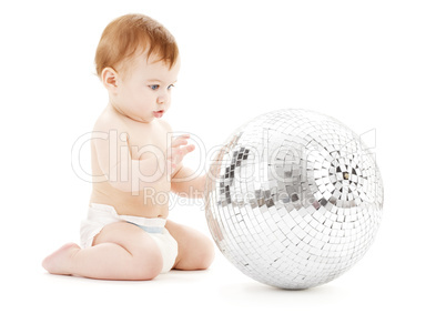 adorable baby boy with big disco ball