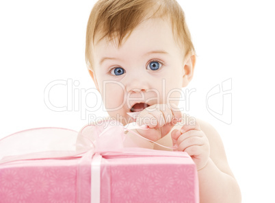baby boy with big gift box