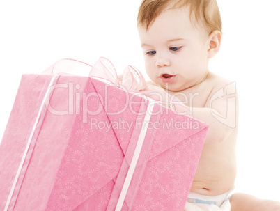 baby boy with big gift box