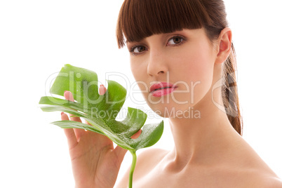 woman with green leaf