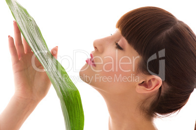 woman with green leaf