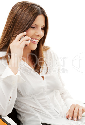 businesswoman in chair with laptop and phone