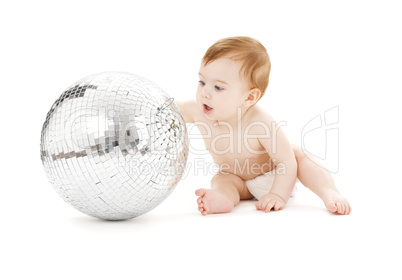 adorable baby boy with big disco ball