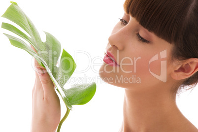 woman with green leaf