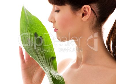 woman with green leaf