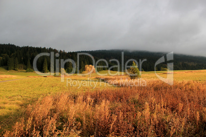 Beautiful landscape by autumnal sunset