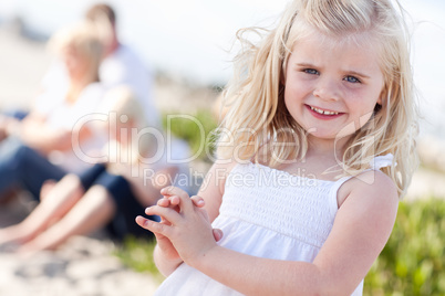 Adorable Little Blonde Girl Having Fun At the Beach