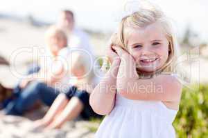 Adorable Little Blonde Girl Having Fun At the Beach