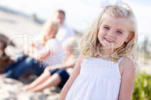 Adorable Little Blonde Girl Having Fun At the Beach