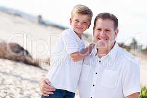 Cute Son with His Handsome Dad at the Beach