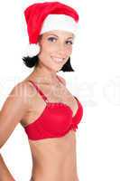 Portrait of beautiful woman in red santa hat