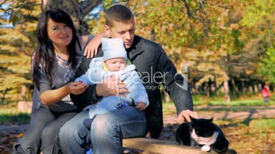 Happy family with cat