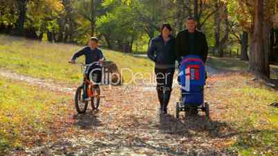 Family on the autumn walk